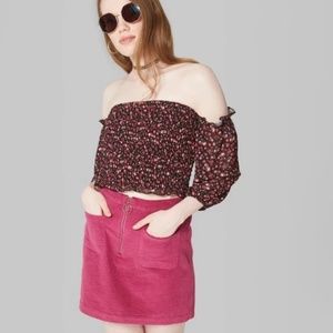 Corduroy zip mini skirt in berry